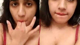 Desi in a XXX red bra flashes her sex pussy and masturbates it on camera