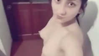 Female ineptly poses on Indian sex camera and shows off her XXX twat