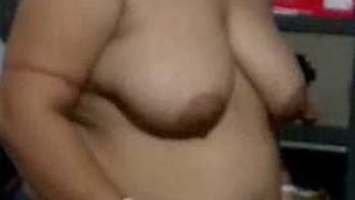 Mature with naked sex titties puts clothes on her XXX body item by item