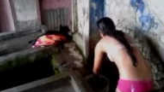 Woman washes her sex body wearing only XXX bra and panties on camera