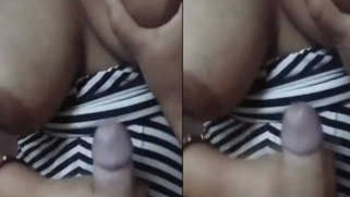 Desi colleen bares XXX tits and starts wanking man's sex instrument