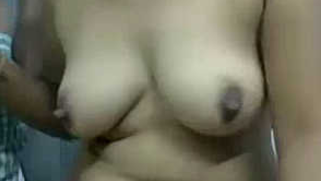 Desi girl exposes her full XXX boobies and man touches them in sex show