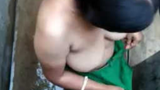 Hot Indian MILF gets rid of clothes freeing XXX boobs in a sex shower