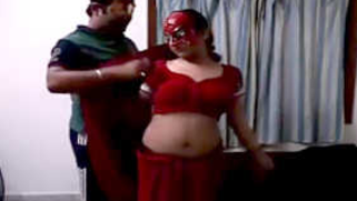 XXX obsessed man tries to get masked Desi sex wife in a red sari naked