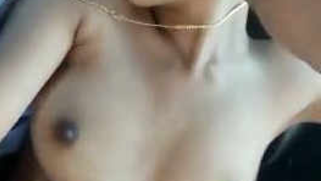 Desi sex girl lies still while man touches her small XXX boobs