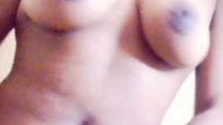 Indian in a blue nightgown exposes her sex boobs on XXX camera