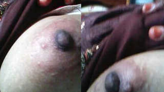 Desi MILF films her naked XXX nipples in close-up sex shooting