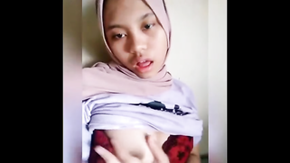 Girl with Malay features doesn't take hijab off but flashes sex parts | XXX Video on AllSex.XXX