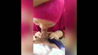 Hijab lover coerces Malay slut into having oral sex with him on camera