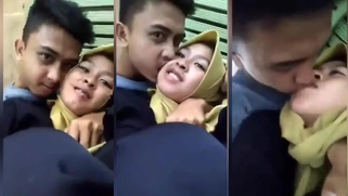 Babe in hijab sticks her tongue out for a self sex Malay video