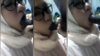 Dark haired Malay girlfriend in a jilbab of mine just gives me a great blowjob