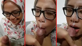 Lewd babe from Malay lets her BF cum on her pretty face and XXX jilbab
