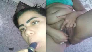 Curvy Desi woman shoves small sex toy into all her welcoming XXX holes