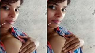 Attractive Desi girl lies on the bed and even flashes her XXX boobs