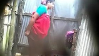 Desi boy catches neighbor almost naked after an outdoor XXX shower