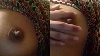 Attractive Desi MILF plays with own natural XXX tits on the camera