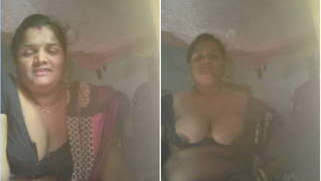 Desi BBW aunty flashes and touches XXX jugs while waiting for hubby