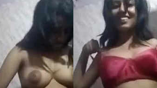 Stunning Desi girl smiles while trying bras on her great XXX breasts