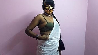 Masked Desi diva in sexy XXX lingerie seductively poses near wall