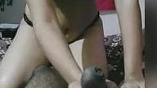 Slender Indian teen begins porn video by gently stroking BF's dick