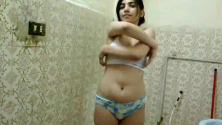 Shower room is a good place to film porn video and Indian babe knows it