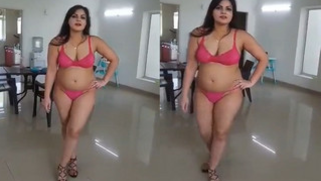 Indian woman in a seductive red swimsuit looks hotter than any porn actress