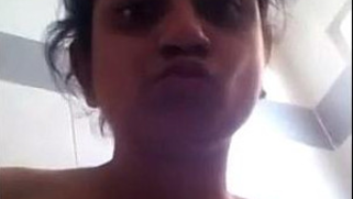 Playful Indian girl comes to the bathroom where does kind of porn things