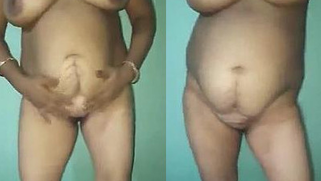 Paunchy Indian woman masturbates pussy like she is a porn actress