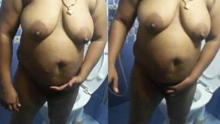 Fat Indian woman comes to the shower room to film a homemade porn video