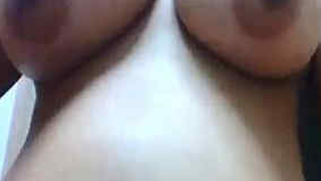 Lubricious Indian MILF touches her muff and natural twins in solo porn clip