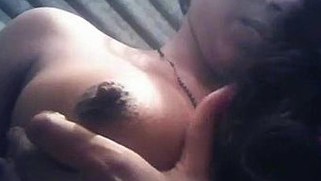 Long-haired Desi sexpot touches hard XXX nipples in amateur sex video