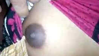 During sex in bed Indian man takes closer look at wife's XXX nipples