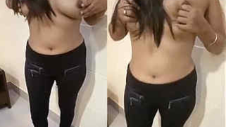 Teen busty Desi poses half-naked on sex camera in her solo XXX show