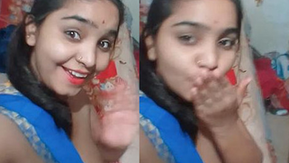 Slutty Desi XXX model pulls blue sari aside and performs sex tits show