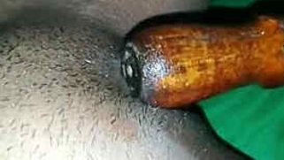 Indian MILF plays sex games with a XXX rolling pin in her sex hole