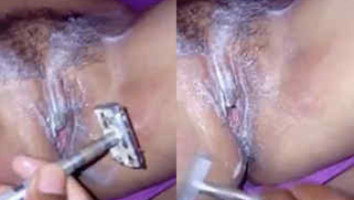 Careful Indian man shaves wife's XXX cave and fingers it before sex