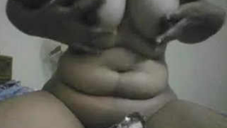 Chubby Indian girl shows she wants sex by grinding XXX twat against bed