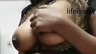 Chesty Desi diva in sari shows natural XXX melons in solo sex clip