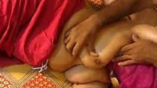 Caring Desi man massages round XXX curves of his fat wife before sex