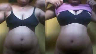 Pregnant Indian female undresses for husband in amateur porn video