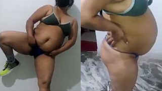 Fatty Indian woman wearing black mask demonstrates porn skills