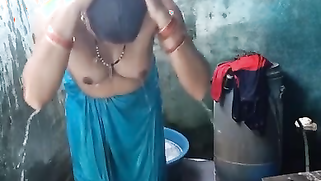 Hot Desi52 video of my aunty taking a shower and she has got a humongous boobs