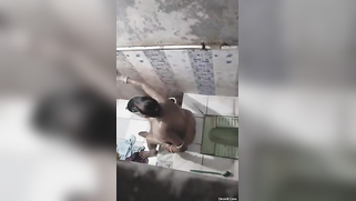 Desi52 mature aunty bathing and flashes tits pervert dewar record