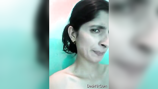 Pretty Paki MILF shows off and touches her ready for sex XXX pussy