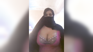 Buxom Paki wife in hijab show tits her lover while husband in the bank