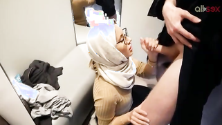 Lewd Paki wife in hijab is happy to suck cock In a store dressing room