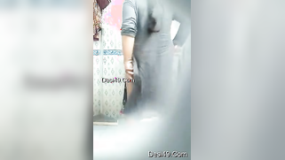 Hot Paki widow bathing outdoor captured from mobile her mad nephew