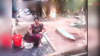 Indian MILF sits outdoors and washes erogenous zones flashing boobs | XXX Video on AllSex.XXX