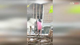 Guy can't take eyes off hot Desi MILF in slinky red dress washing | XXX Video on AllSex.XXX