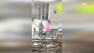 Guy can't take eyes off hot Desi MILF in slinky red dress washing | XXX Video on AllSex.XXX